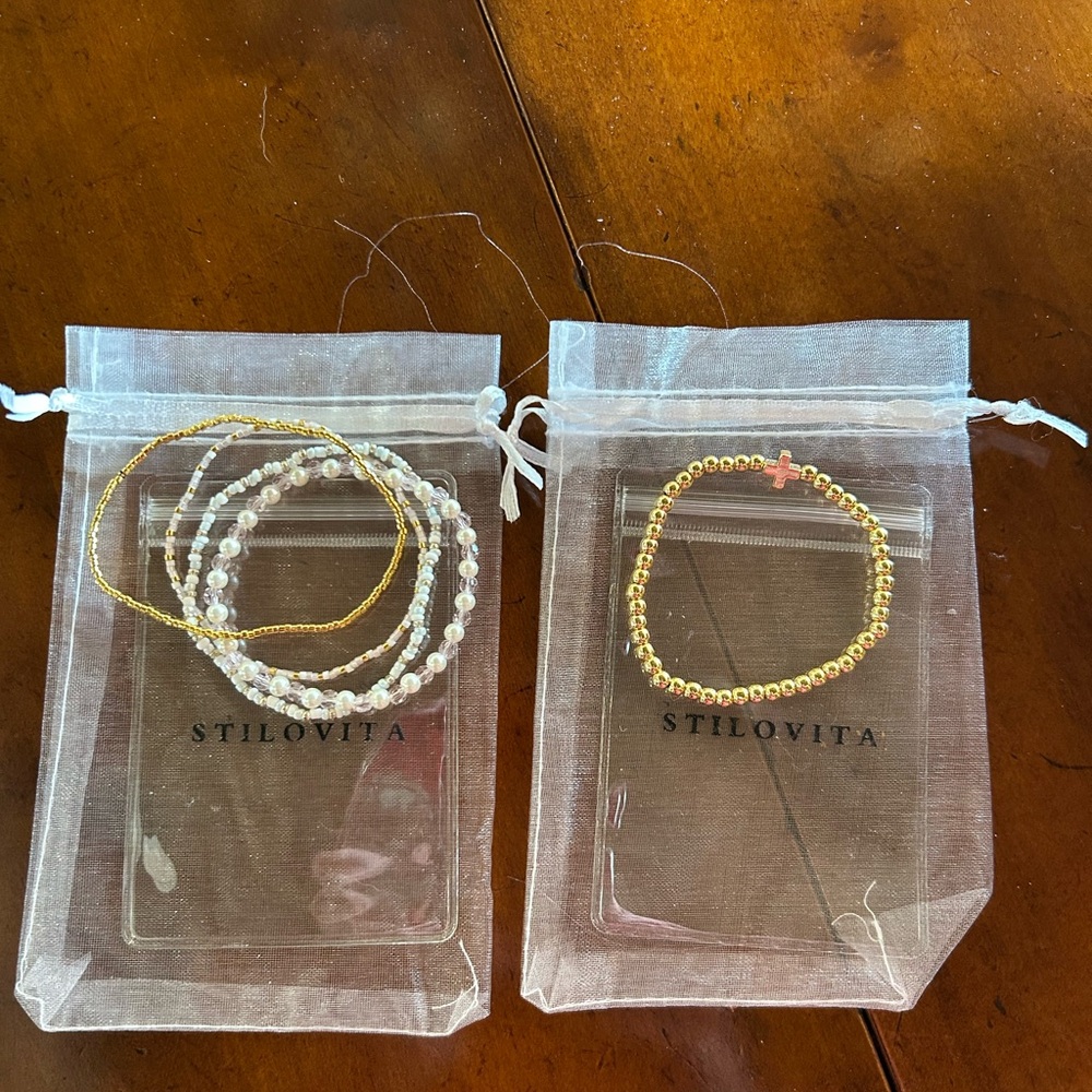 Stilovita gold cross beaded bracelet plus 4 stacking braceletss